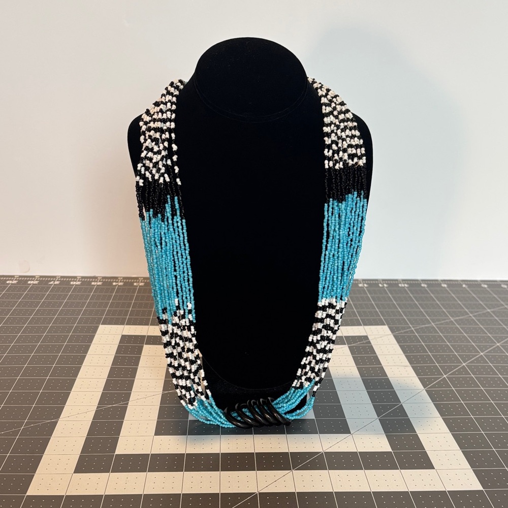 Elegant Beaded Necklace - Black, White, and Blue